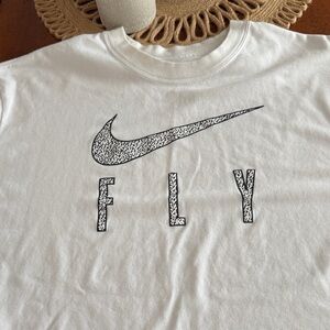 Nike White Tee with Black Speckled Swoosh and FLY Print